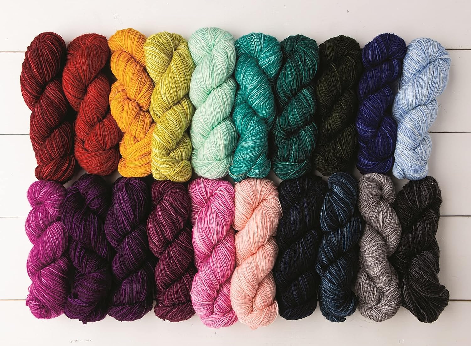 image:imageKnit Picks Hawthorne Black Merino Wool Sock Yarn for Knitting 100g hank of hand dyed yarn for socks in Blackbird color machine washableVolcano